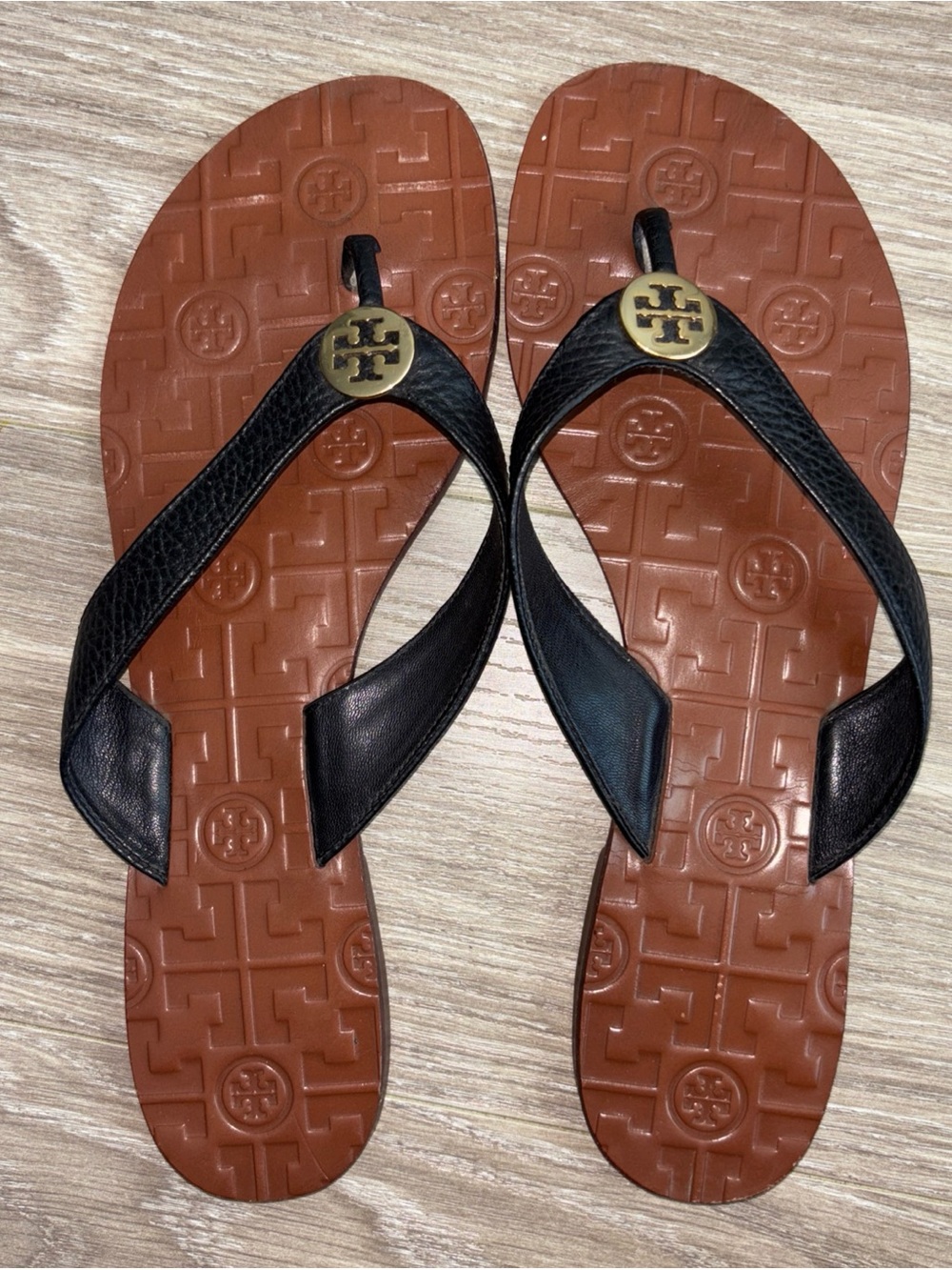 Tory Burch Black Leather Thong Sandals with Brown Footbed and Gold Logo
